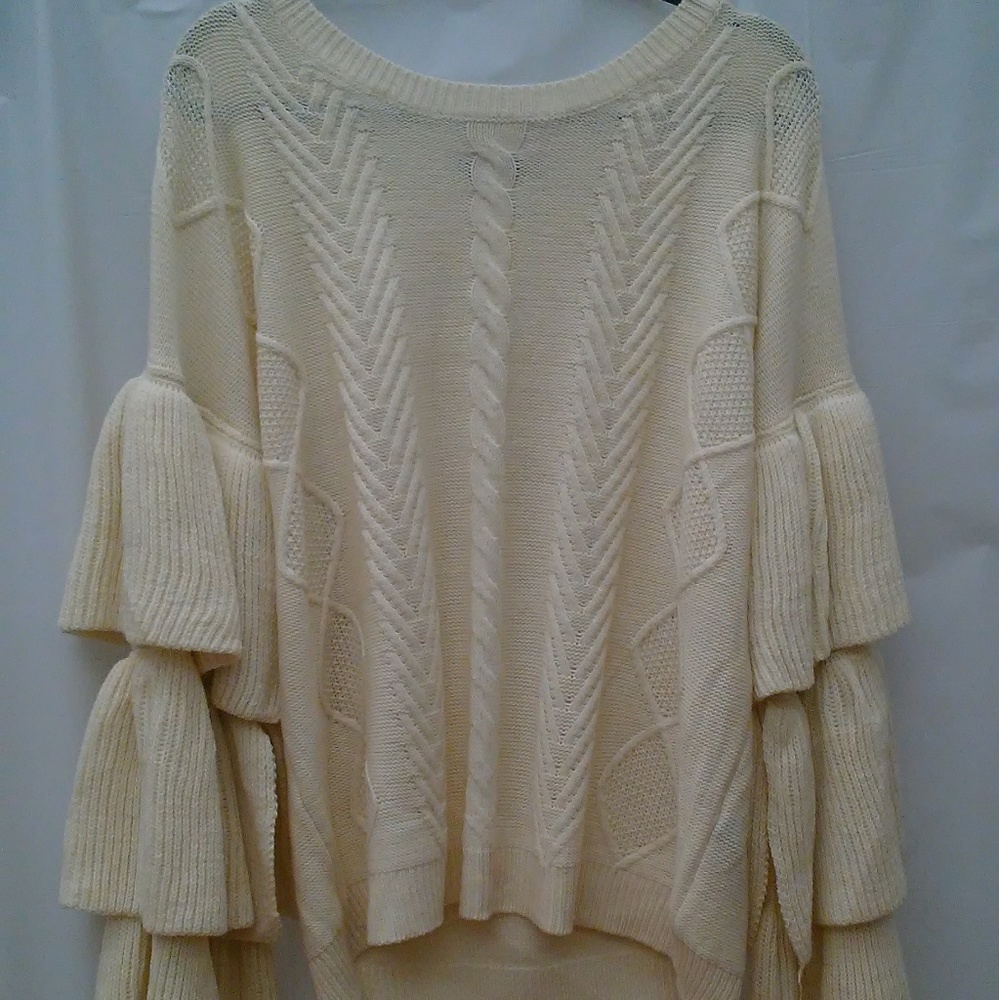 Long bell sleeved Sweater
